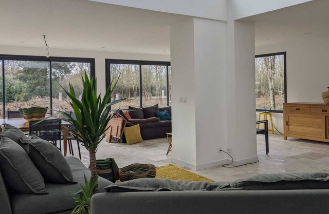 Contemporary house in a wooded garden