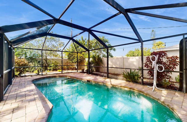 Contemporary and cozy home with heated pool, central location, close to beaches