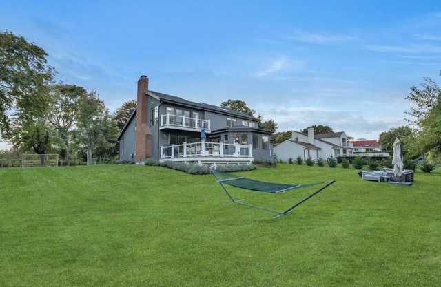 Contemporary Colonial home with pristine Peconic bay views, steps to.