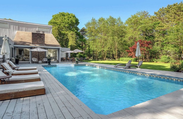 Contemporary home close to beaches with private pool, open floorplan, and.