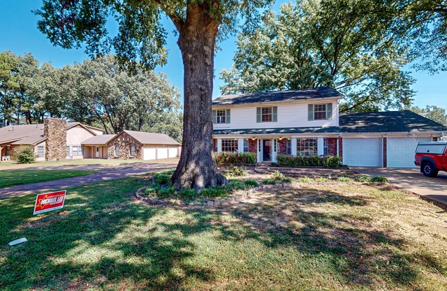 Conveniently located home with pool, yard, patio, grill, & washer/dryer