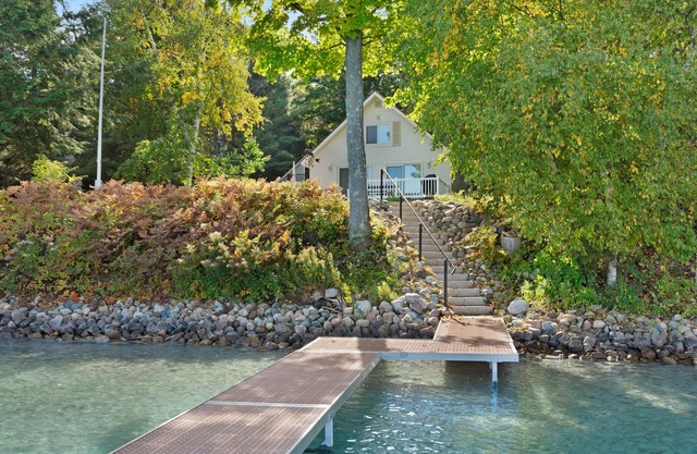 Cottage with lake views, private dock & firepit - near public boat launch