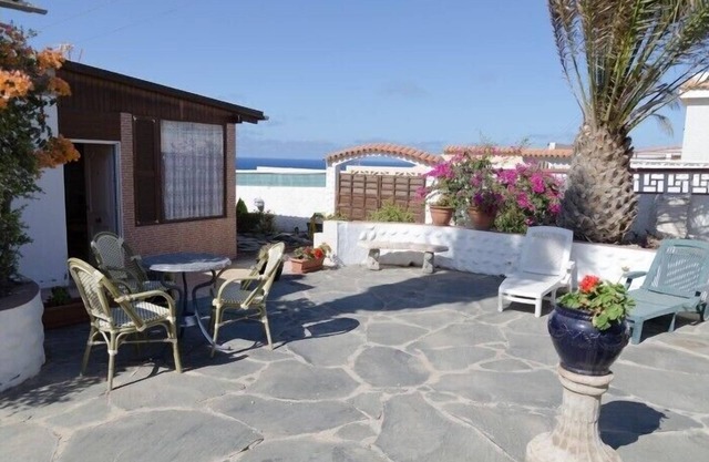 Cottage with large garden on the beach