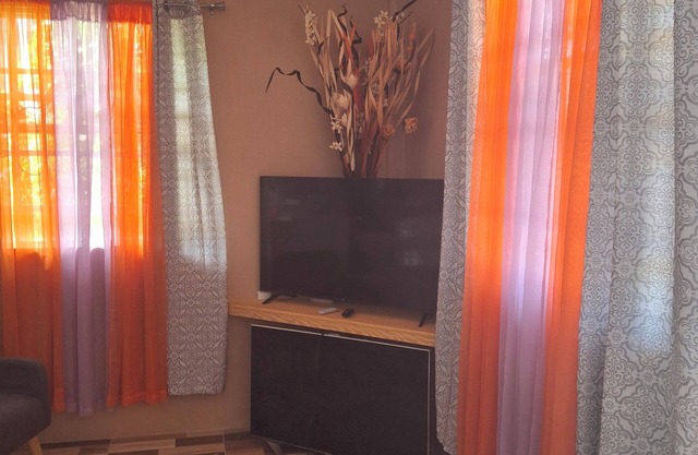 Cozy 2-bedroom apartment in Pte Michel with WiFi, AC, Fans, TV, Full Kitchen