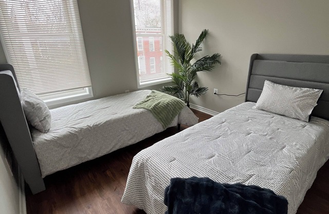 Cozy 2-bedroom townhome in charming Baltimore with AC, fitness room, WiFi