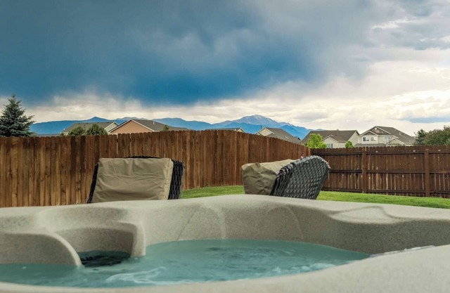 Cozy 6BR Colorado Springs Retreat w/Hot Tub, Gym, Theater & Sunset Views!