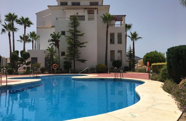 Cozy apartment with beautiful view on golf course, mountains and nature reserve.