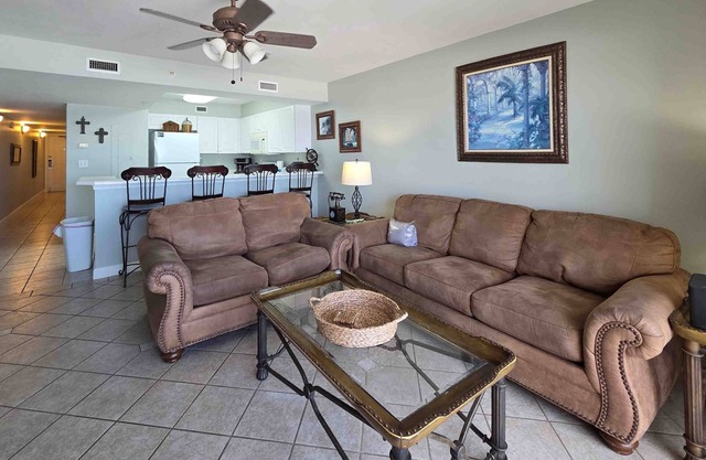 Cozy beachfront condo with private balcony, shared pool & beach access