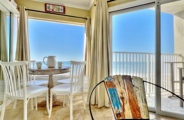 Cozy Beachfront Retreat right on the Sand, Sparkling Pool, & Charming Coastal Flair!