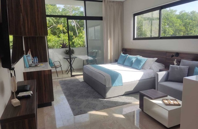 Cozy fully equipped studio with balcony in Tulum with amazing pool inthe rooftop