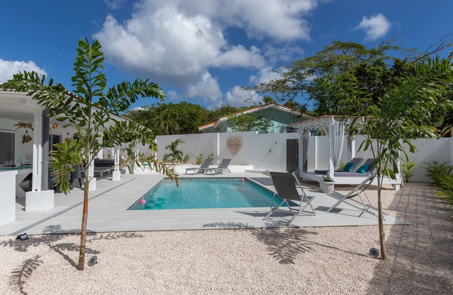 Cozy Holiday Home with private pool, outdoor kitchen and large private garden.
