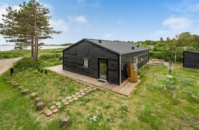 Cozy home in Knebel with house sea view
