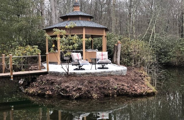 Cozy home with hot tub and pool, which has incredible fire pit table.