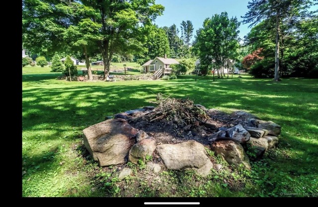 Cozy home with large deck, private river access and 1acre yard all to yourself!