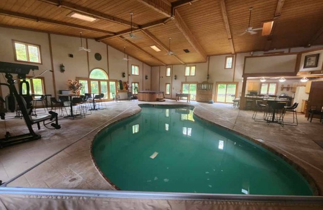 Cozy lodge with indoor pool, hot tub, loft and more! Great for a close getaway!