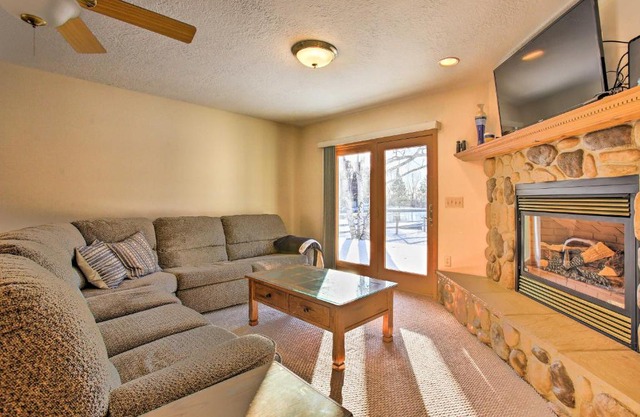 Cozy Riverfront Home with Fire Pit in Houghton Lake!