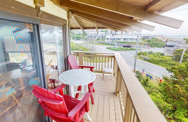 Cozy studio condo with bay views, deck, and beach steps away
