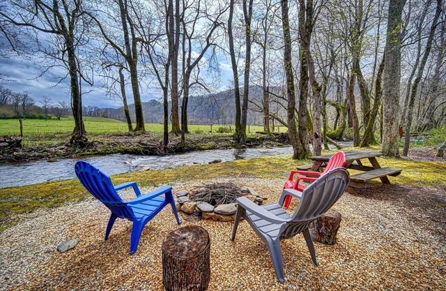 Creekfront Hayesville retreat w/wrap-around porch and views!