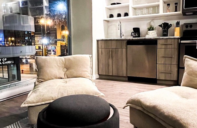 Dark themed minimalist apart at the heart of downtown Winnipeg .