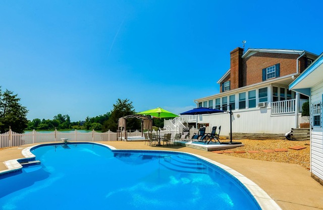 Delightful Dog-Friendly Lake House w/ a Private Pool, Dock, Tennis Court, & More