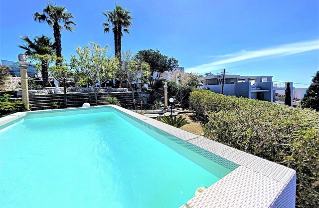 Designer pool house within walking distance of the sea