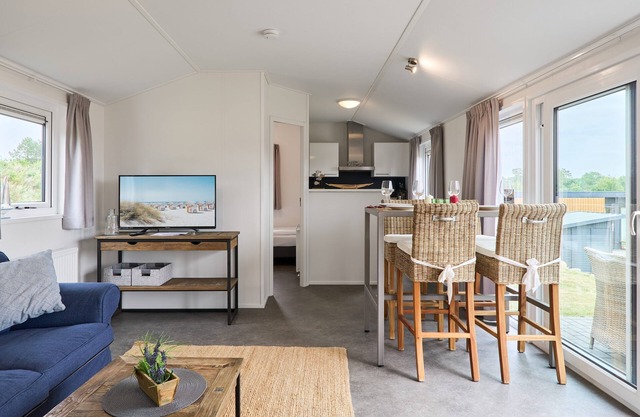 Detached vacation home Seeleuchten with terrace on the lake in Seeparx Süsel