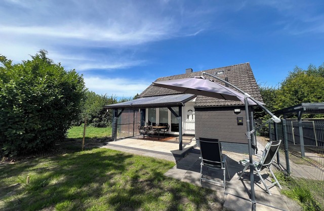 Detached vacation home with covered terrace and garden in Sehestedt