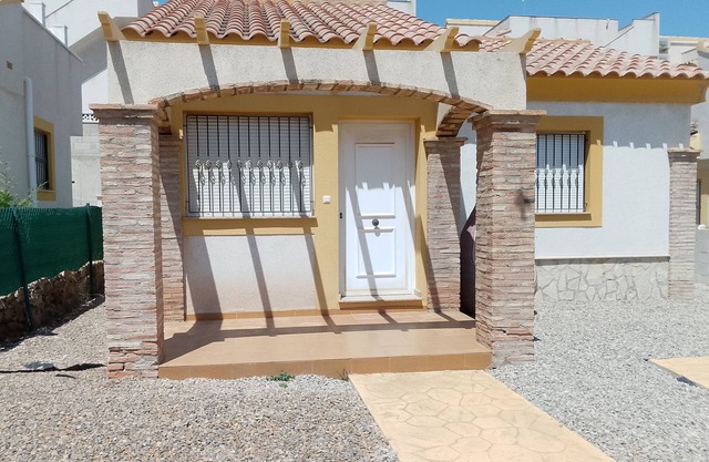 Detached Villa with Communal Pool Close to beaches and Golf Course.