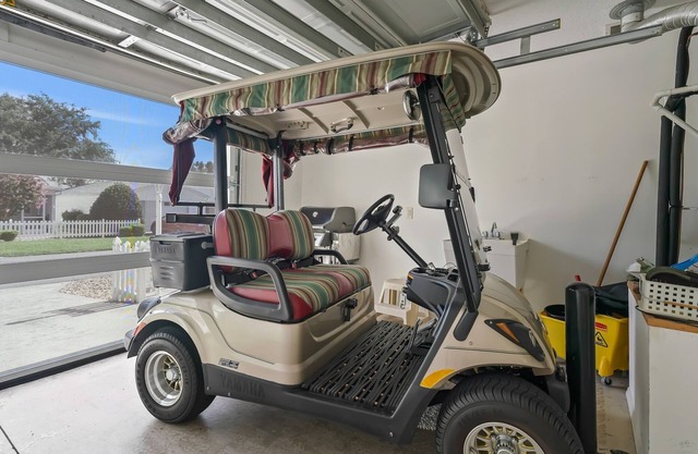 Discover Relaxation and Fun in a Charming Patio Villa with a Golf Cart!