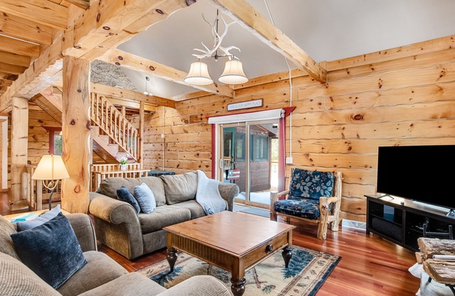 Dog-friendly cabin on expansive land with a firepit, grill, game room, & W/D