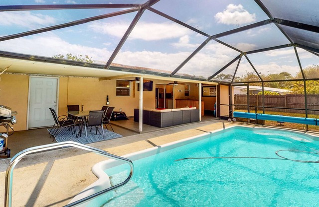 Dog-friendly coastal home with private pool, bar, & grill