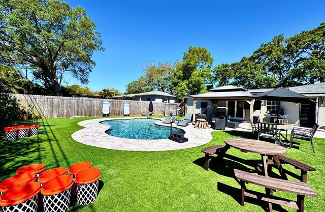 Dog Friendly home w a pool and pickleball court minutes from downtown and beach