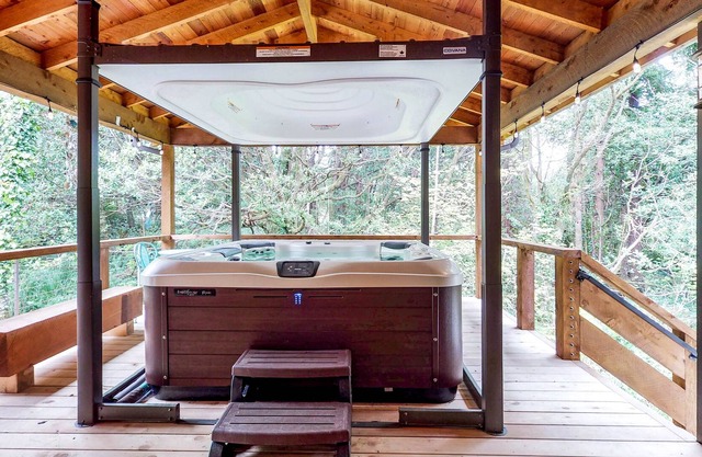 Dog-friendly home with private hot tub and space for a large group