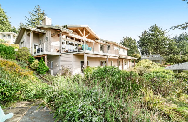 Dog-friendly ocean-view home near the beach with large deck, grill, & Ping-Pong