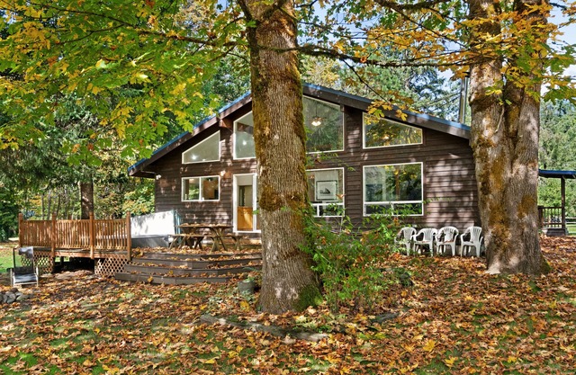 Dog-friendly riverfront cabin w/Private Hot Tub, Wood Stove, near Ski resort