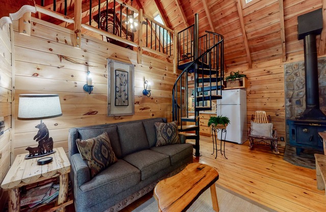 Dog-friendly waterfront cabin with a firepit & porch swing