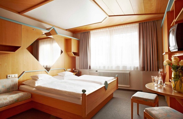 Double room with half board - Hotel Wirtshaus Taube