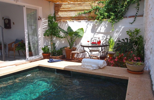 El Patio de Lola, an Andalusian village house with green marble splash pool.