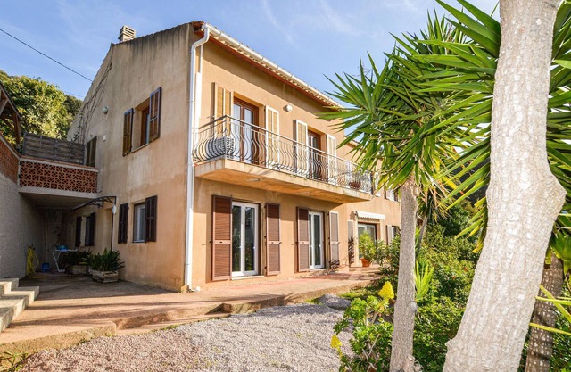 Enjoy an enchanting view of the countryside in this appealing vacation apartment near the sea.