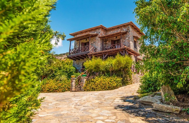 Enjoy breathtaking sea views from the balconies and terraces of this beautiful vacation home set ami