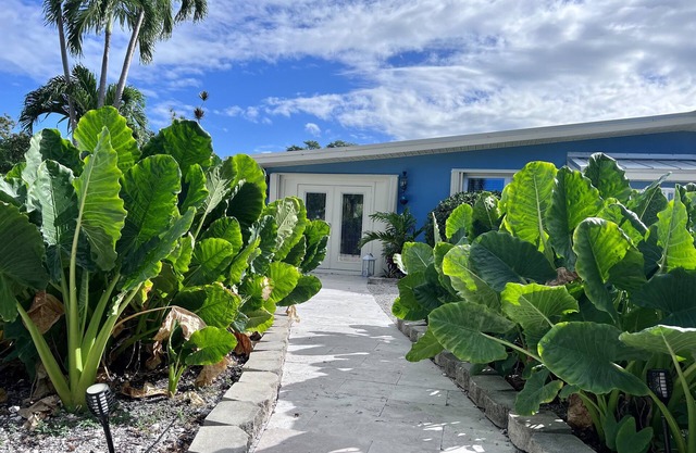 Escape to the Florida Keys to this tropical canal-front home with boat dockage.