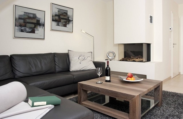 Exclusive 5-star vacation apartment in a top location, with sauna, fireplace & large balcony.
