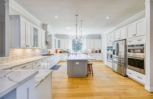 Exquisite lakefront home with game room, kayaks, lovely deck, washer/dryer & AC