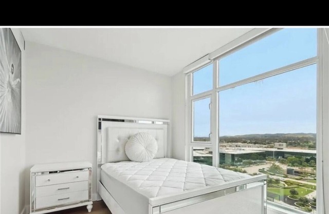 Extra luxurious high rise condo with panoramic views close to UCI and airport.