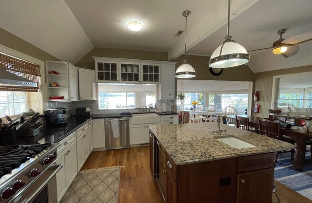 Fabulous Magician Lake House with huge yard and excellent lake frontage