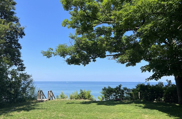 Family cottage on 100 ft of private Lake Michigan beach