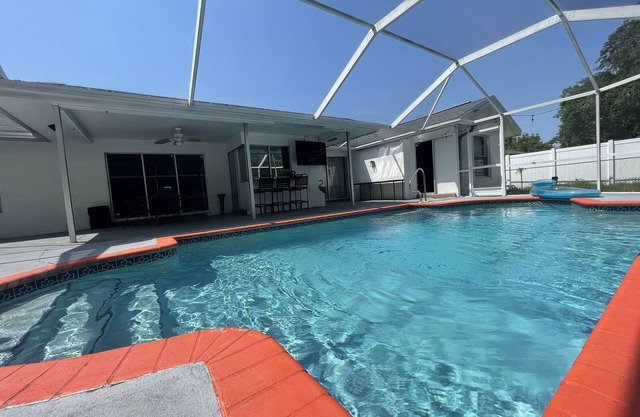 Family Home w/Pool , On Golf Course & Near Beach !