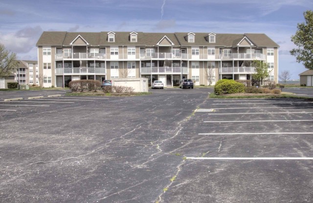 First Floor Contemporary with Top Bay View, Pool, Tennis & Free Activities Including Golf and More.