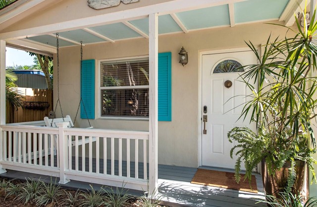 Florida bungalow with loads of charm in tropical and private setting.