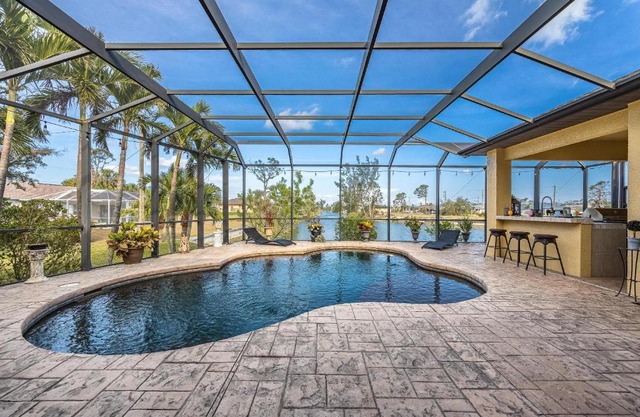 Fresh Water Canal, Kayaks, Heated Pool - Villa Windows on the Water - Roelens Vacations